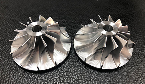 What are the advantages of using rapid prototyping technology for automotive impellers?